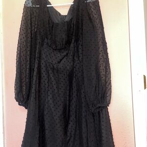 Black square neck mini dress with swiss dots.